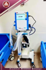 real photo of MEK MTV1000 ventilator, Korean-made, with a turned on 7-inch touch screen, white-blue design with 4 wheels