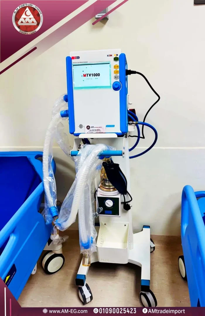 real photo of MEK MTV1000 ventilator, Korean-made, with a turned on 7-inch touch screen, white-blue design with 4 wheels