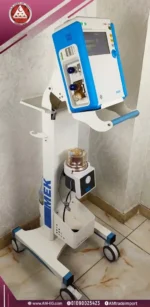 Side-angle natural view of the MEK MTV1000 ventilator, made in Korea, 7-inch touch screen, white-blue design with 4 wheels