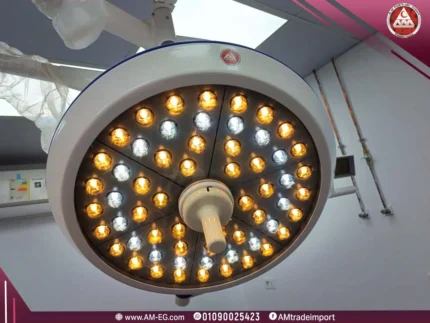 A close-up, low-angle, real-life image of a white LED surgical light box (2 compartments) inside an operating room.