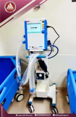 real photo of MEK MTV1000 ventilator, Korean-made, with a turned on 7-inch touch screen, white-blue design with 4 wheels