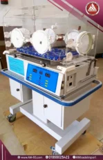 AM3000 neonatal incubator side view with transparent hood, blue control panel, digital screen, and sensors