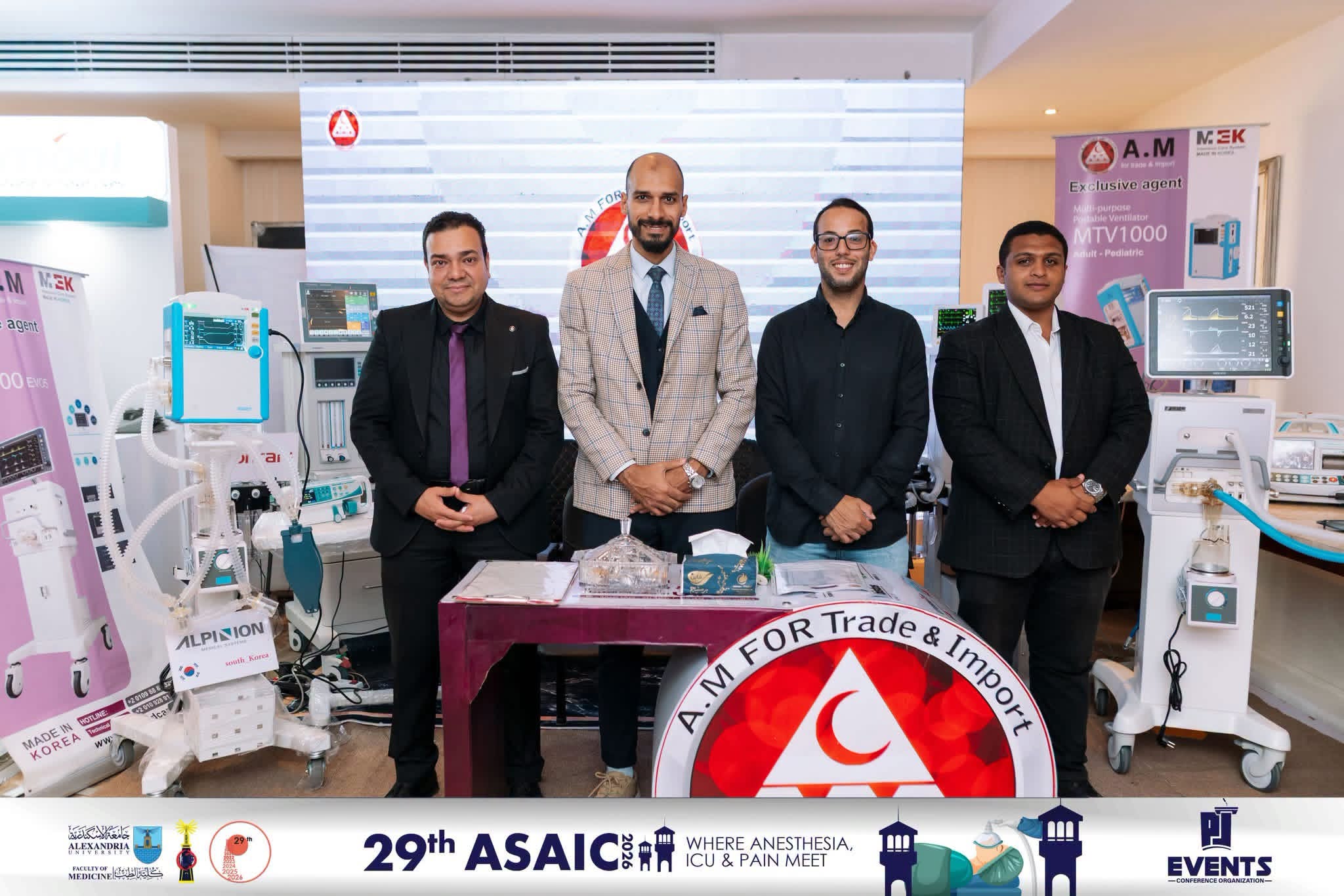 AM Al-Ameen team at the 29th ASAIC 2026 conference booth in Alexandria, surrounded by ventilators and patient monitors